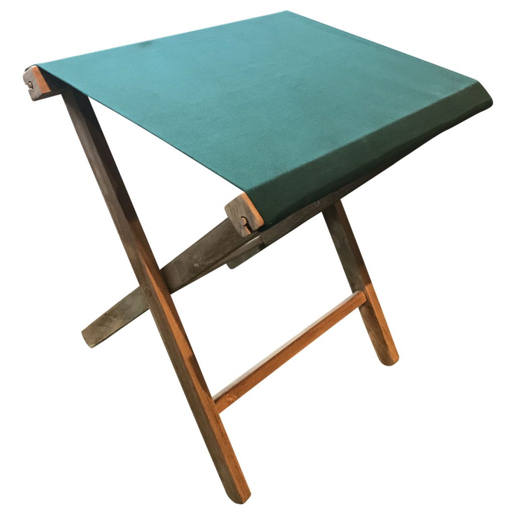 green folding wooden stool